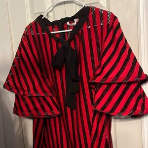 Brand:Kaktus, size:2X, Colors:red and black. With a black bow tie in the front.